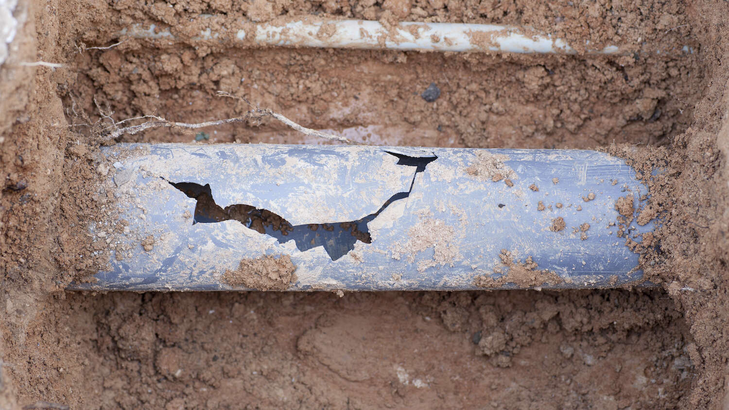 broken sewer line pipe